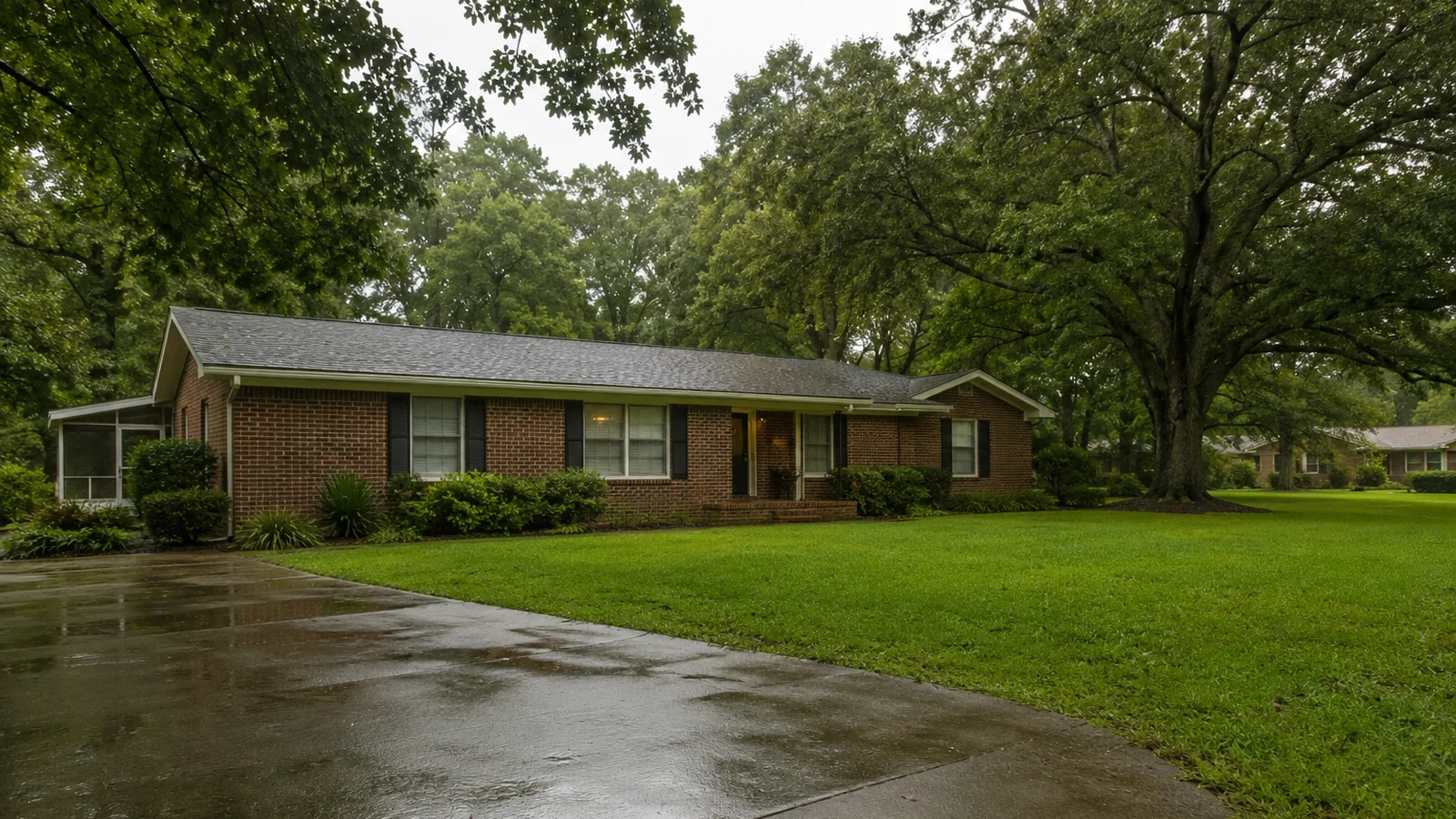 A single-story home with mature shade trees